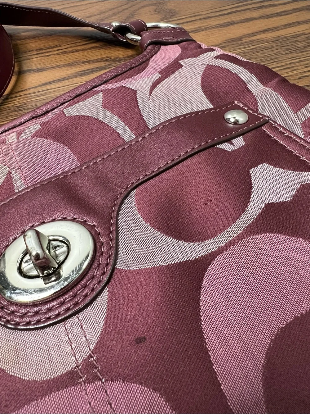 Coach Penelope Optic Signature Hippie Crossbody Bag in a purple/plum color